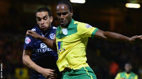 Cameron Jerome holds of Giuseppe Bellusci