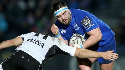 Michele Visentin attempts to tackle Leinster prop Marty Moore