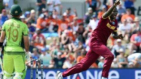 Jason Holder celebrates