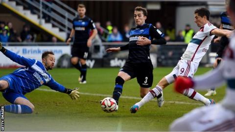 Bayern Munich striker Robert Lewandowski scores against SC Paderborn
