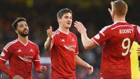Kenny McLean (centre) set-up Adam Rooney's second goal