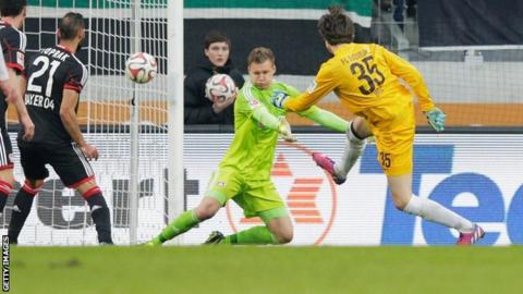 Augsburg goalkeeper Marwin Hitz scoring against Bayer Leverkusen
