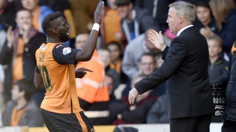 Bakary Sako celebrates a goal with Wolves boss Kenny Jackett