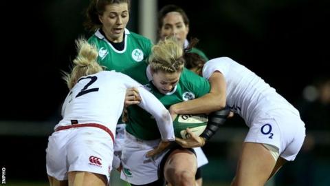England pair Ceri Large and Abigal Brown halt the run of Niamh Briggs