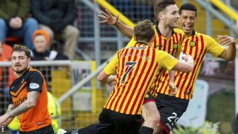 Stephen O'Donnell celebrates after netting the opener for Partick Thistle at Tannadice