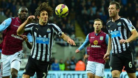 Mike Williamson and Fabricio Coloccini