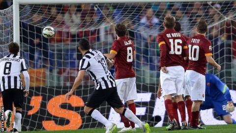 Carlos Tevez scores