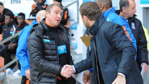 Blackpool boss Lee Clark shakes hands with his Gary Rowett, his successor as Birmingham City manager, prior to the Tangerines' 1-0 win at Bloomfield Road in December