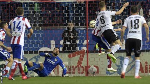 Shkodran Mustafi scores against Atletico Madrid