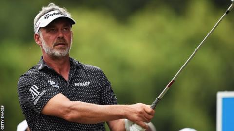 Darren Clarke plays a shot during Friday's second round