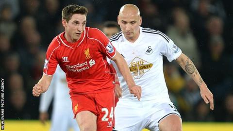 Joer Allen in action against Swansea City's Jonjo Shelvey
