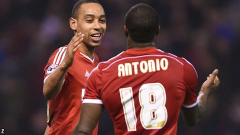 Dexter Blackstock (left) celebrates with fellow goalscorer Michail Antonio