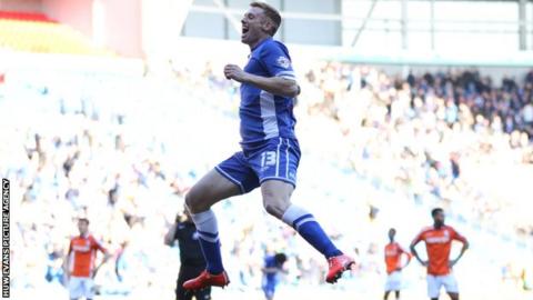 Eoin Doyle celebrates scoring for Cardiff City