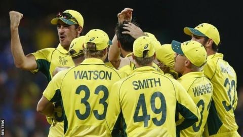 Mitchell Starc (L) celebrates with team mates