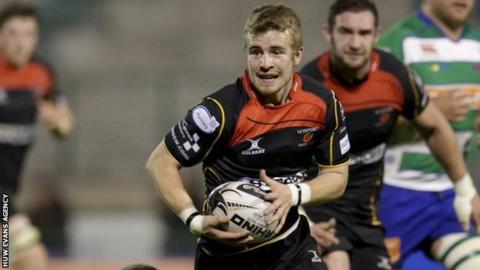 Jonathan Evans breaks away for the Dragons