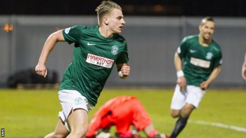 Hibernian forward Jason Cummings celebrates after scoring against Dumbarton