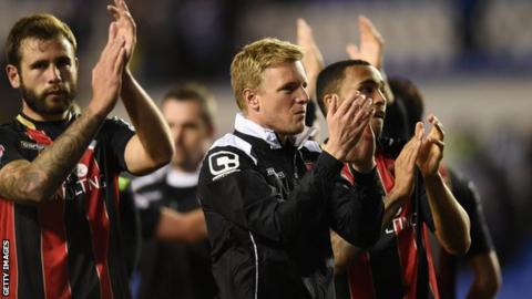Eddie Howe (centre) at the Madejski Stadium