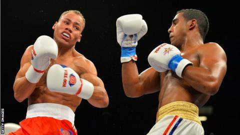 Troy Williamson (left) during his defeat against Arlen Lopez Cardona of Cuba