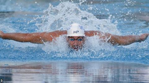 Michael Phelps en route to victory in the 100m butterfly in Phoenix