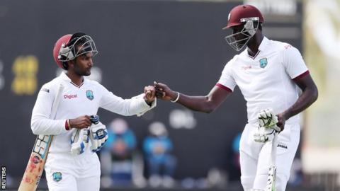 Denesh Ramdin and Jason Holder