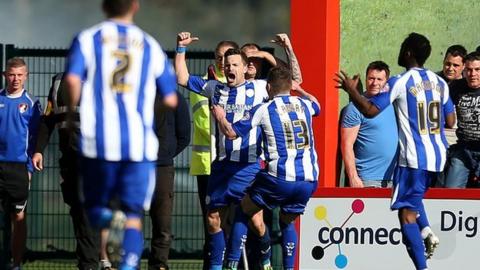 Chris Maguire celebrates Sheffield Wednesday's equaliser