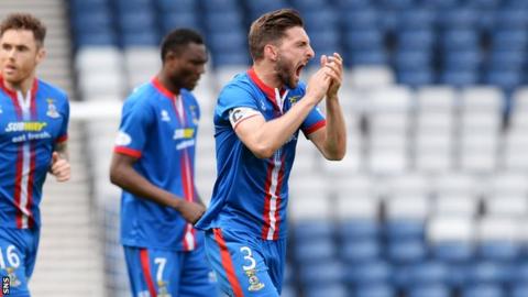 Graeme Shinnie celebrates as Inverness defeat Celtic