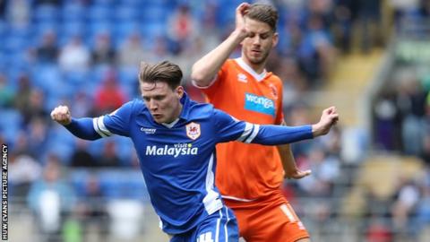 Cardiff City's Joe Mason on the attack against Blackpool