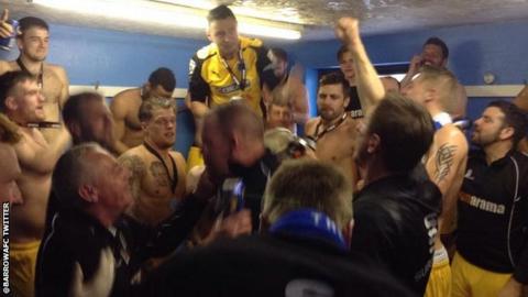 Barrow players celebrate promotion