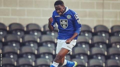 Adriano Moke celebrates scoring against Barnet