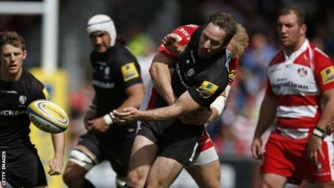 Matt Kvesic tackles Tomas O'Leary