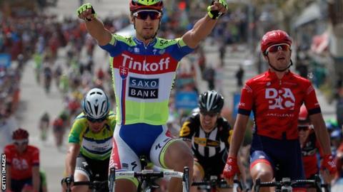 Peter Sagan (left) celebrates victory from Wouter Wippert (right) with Mark Cavendish (centre) third