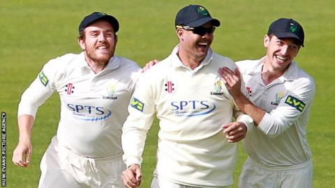 Jacques Rudolph celebrates with team-mates Will Bragg and Andrew Salter