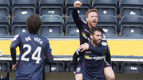 Rocco Quinn (bottom) celebrates his goal before the club announced he had signed a two-year deal