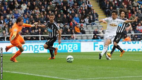 Jack Cork in action for Swansea City against Newcastle United