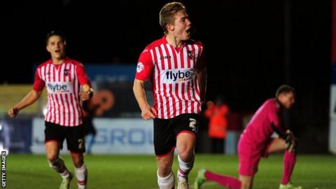 Exeter City celebrate scoring a goal