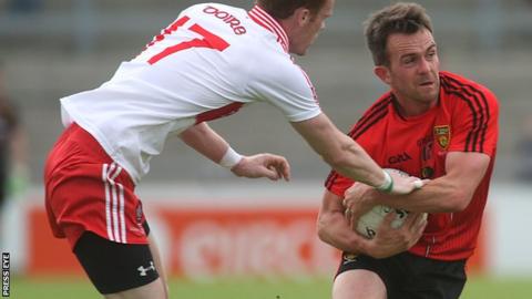 Mark Poland (right) returns to the Down team to face Derry in Sunday's Ulster SFC tie