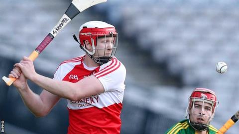 Derry's Alan Grant clears the ball during the county's Christy Ring Cup final against Kerry in Croke Park