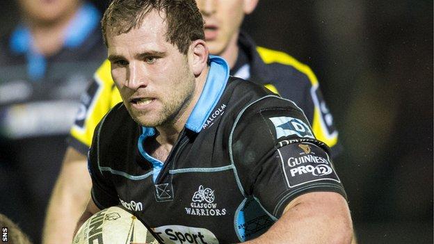 Glasgow hooker Fraser Brown takes on the Ulster defence