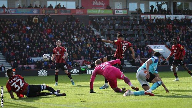 Dominic Solanke (third from right) scores for Bournemouth against Derby