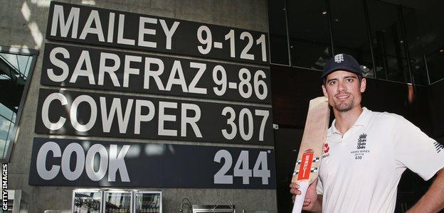 Alastair Cook in front of an honours board at the MCG