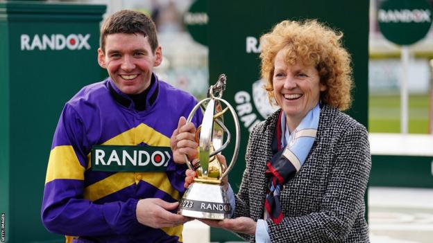 Jockey Derek Fox and trainer Lucinda Russell after winning the Grand National with Corach Rambler
