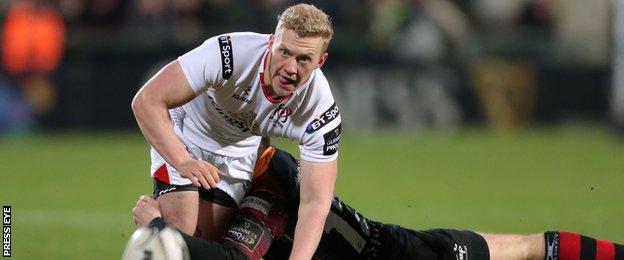 Ulster's Stuart Olding is tackled by Dragons' Adam Warren