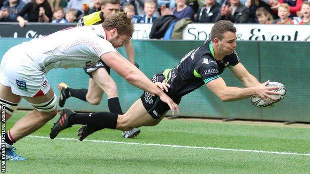 Ospreys wing Tom Habberfield dives over for the opening try