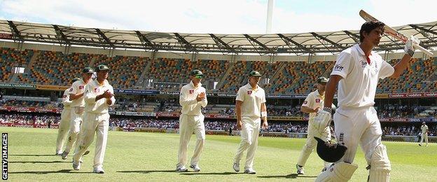BRISBANE, AUSTRALIA - NOVEMBER 29: Alastair Cook and Jonathan Trott of England leave the ground after England declared their second innings during day five of the First Ashes Test match between Australia and England at The Gabba on November 29, 2010 in Brisbane, Australia. (Photo by Ryan Pierse/Getty Images)