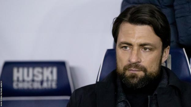 Russell Martin watches on at The Den during Tuesday's Championship match with Millwall