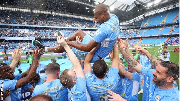 Fernandinho was lifted into the air by his team-mates after Manchester City were confirmed as champions on the final day of the 2021-22 Premier League season