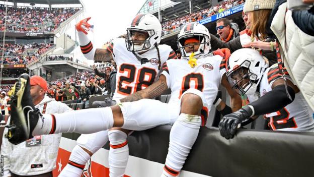 The Cleveland Browns celebrate victory