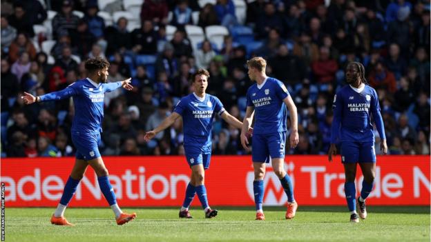 Cardiff players arguing after conceding