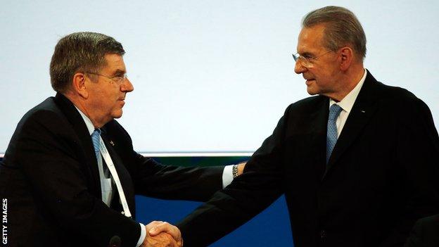 Rogge was succeeded by Bach (left) in 2013