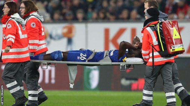 Senegal's Salif Sane being is taken fro the pitch on a stretcher